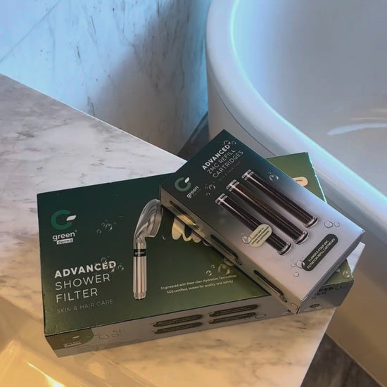 Green Derma filtered shower head in use