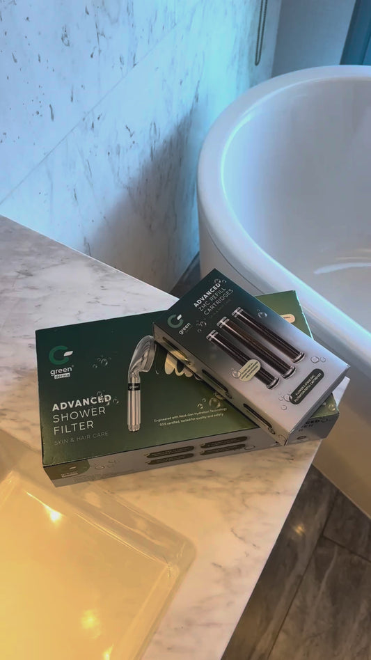 Green Derma filtered shower head in use